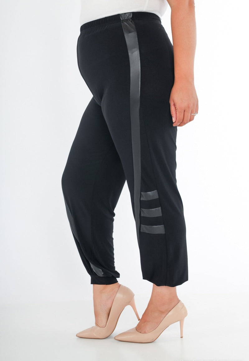 Pantaloni in vita elastica con pelle PU