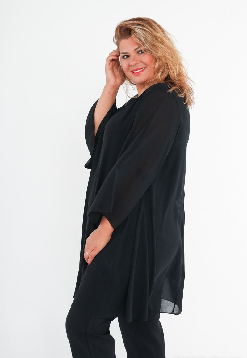 Blusa/vestito con maniche a campana