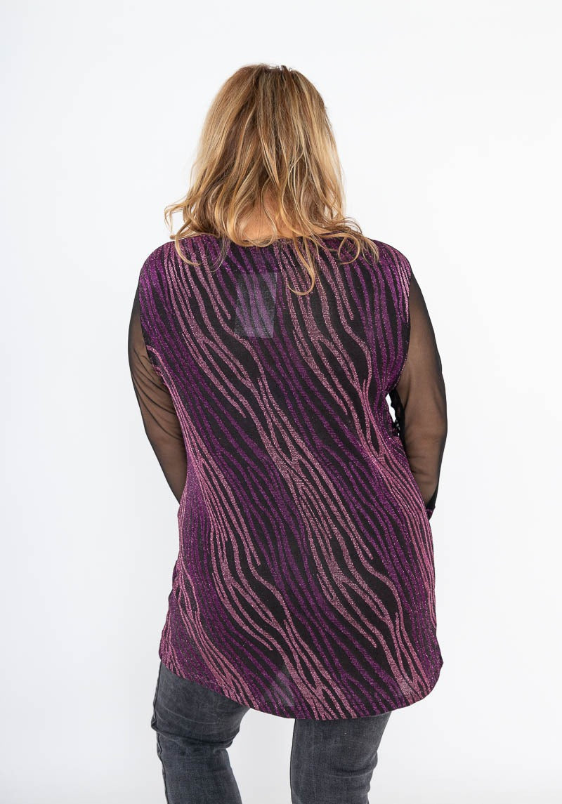 Tunica con paillettes con maniche di tulle