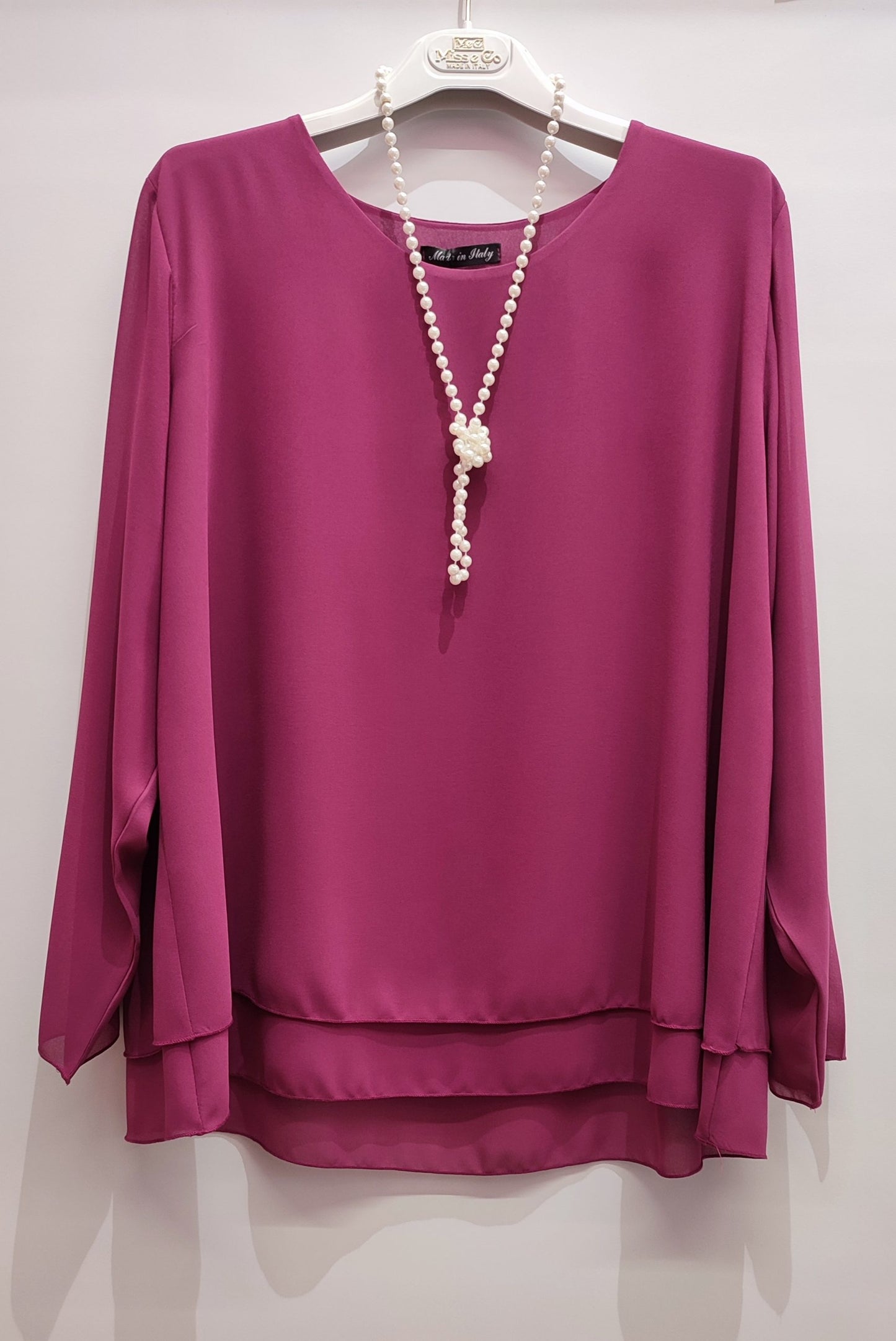Blusa con balza