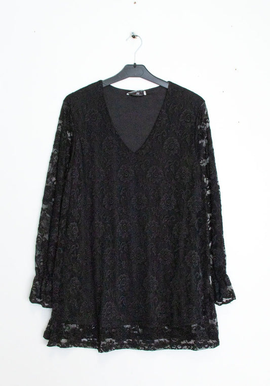 Camicetta di pizzo con maniche svasate