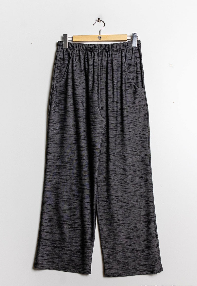 Pantaloni sciolti con tasca