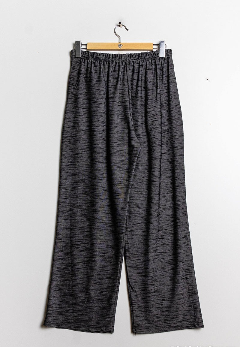 Pantaloni sciolti con tasca