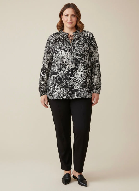 Camicia floreale con fiocco sul collo