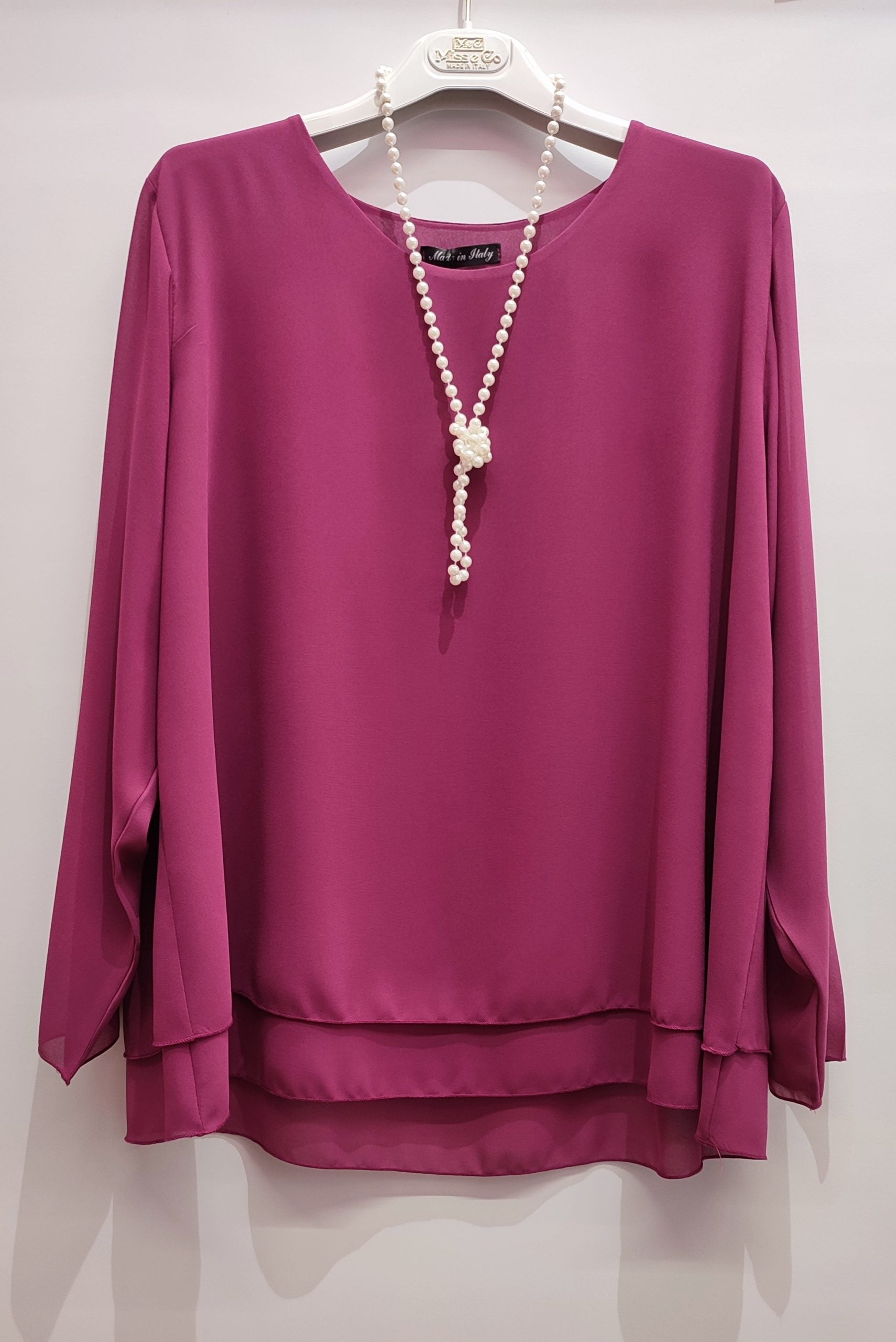 Blusa con balza