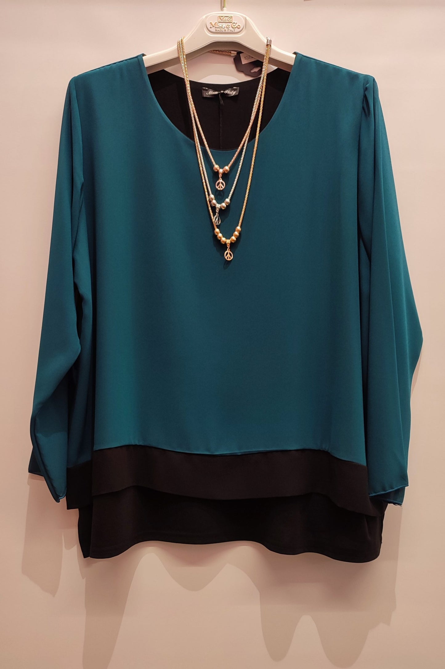 Blusa con balza