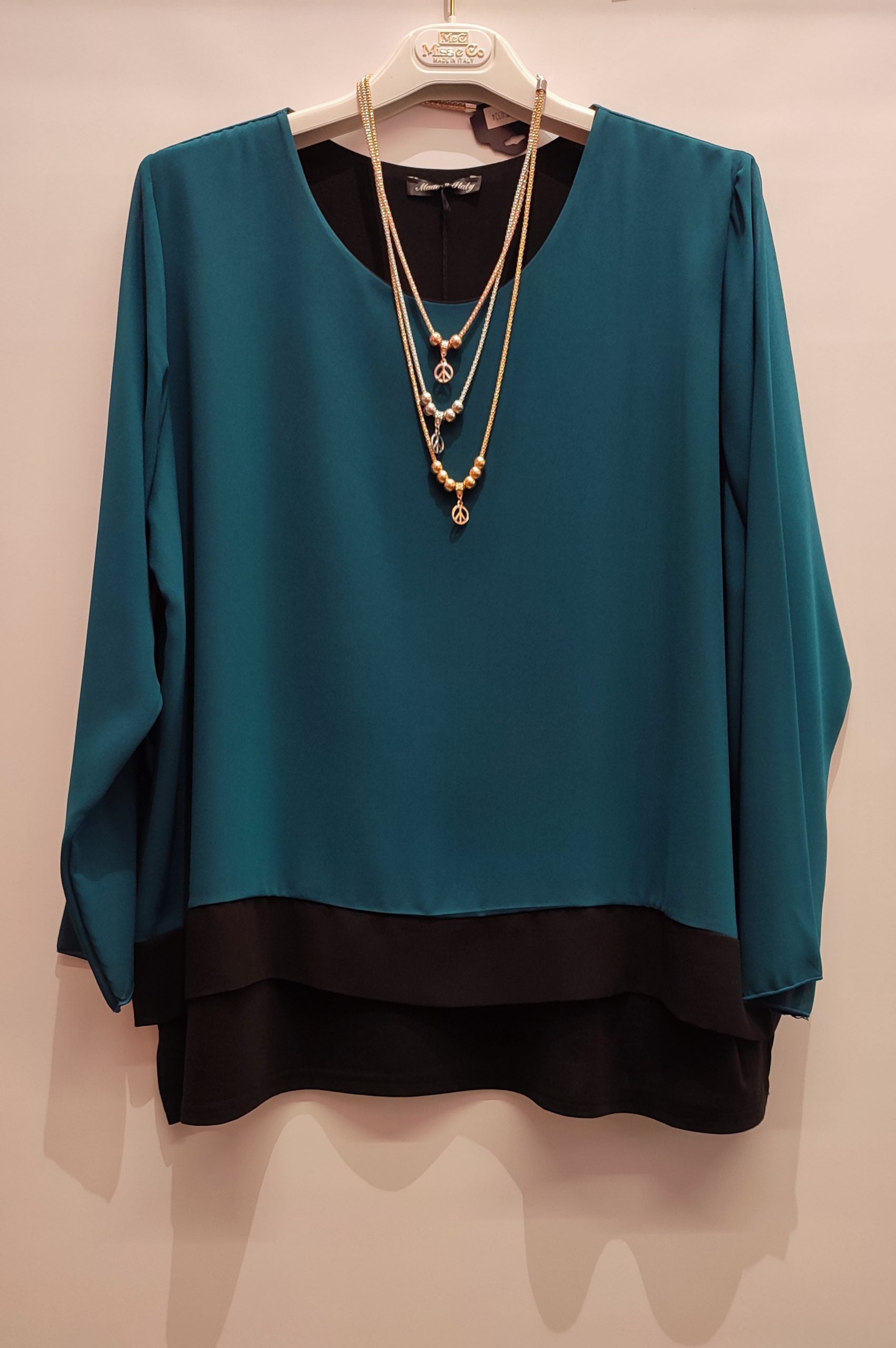 Blusa con balza