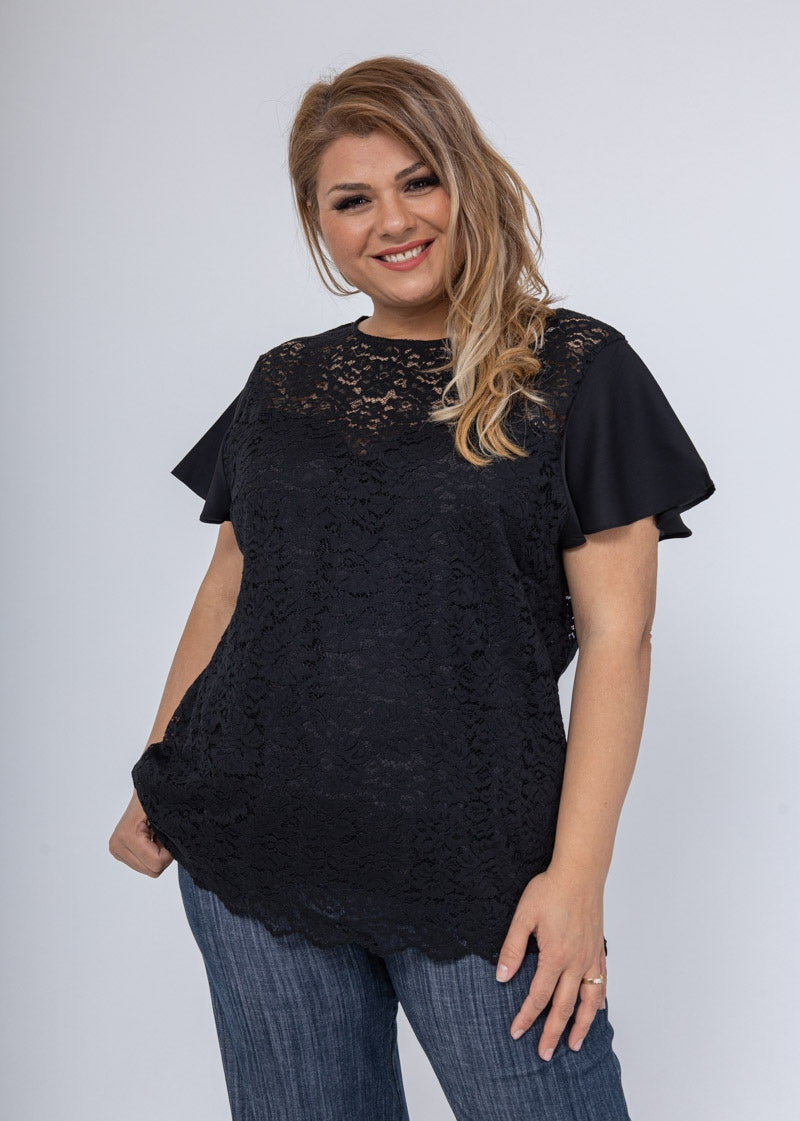 Blusa con maniche volant