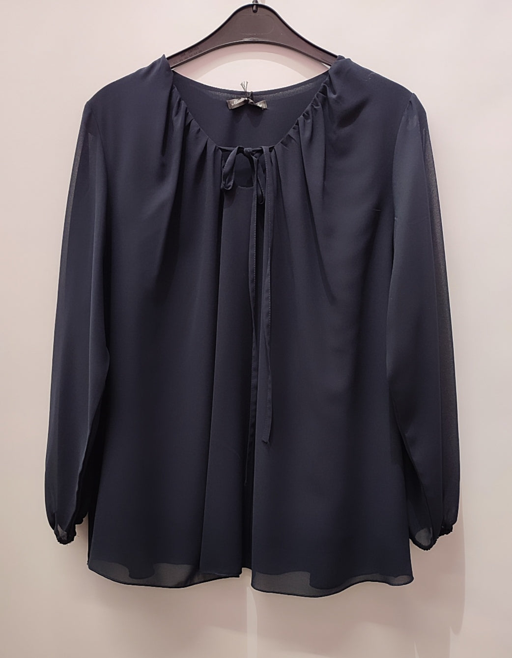 Blusa con fiocco