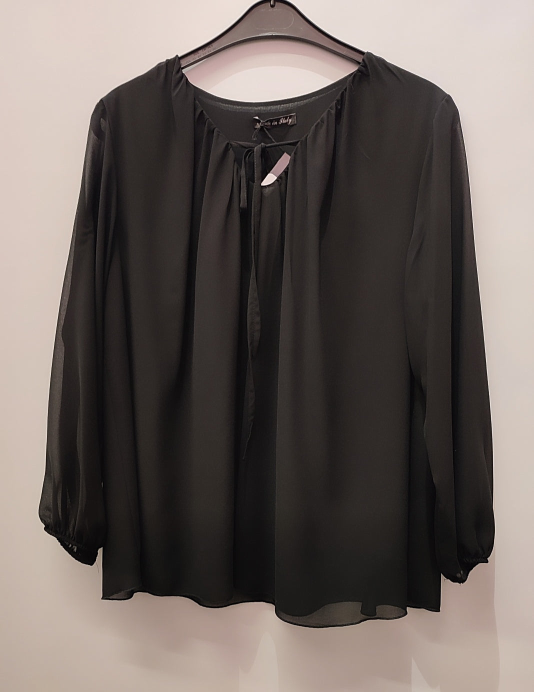 Blusa con fiocco