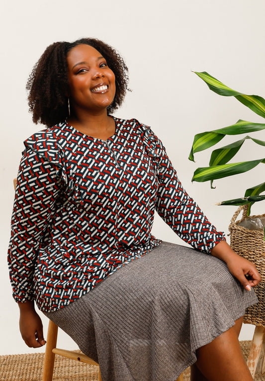 Blusa Elegante e Versatile – Fantasia Geometrica, Modello Sfiancato